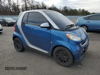 2008 Smart fortwo Pure with VIN WMEEJ31X08K173339, listed as a Copart auction lot 52351895 with 122,923 mi miles and Clean Title. Bid and sale history available at DreamBid. Image 4.