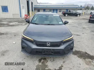 2024 Honda Civic Sport z VIN 2HGFE2F5XRH580233, wystawiony jako Copart lot #52956535 z przebiegiem 9852 mil mil oraz Szkody całkowita. Historia ofert i sprzedaży dostępna na DreamBid. Obrazek 5.