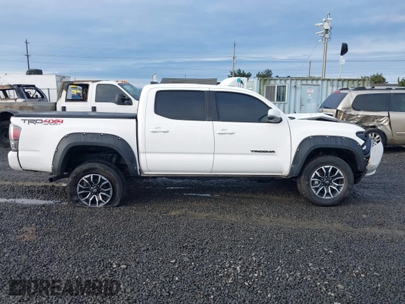 2021 Toyota Tacoma SR z VIN 3TMCZ5AN2MM426723, wystawiony jako IAAI lot #41604033 z przebiegiem 46 522 mil mil oraz . Historia ofert i sprzedaży dostępna na DreamBid. Obrazek 14.