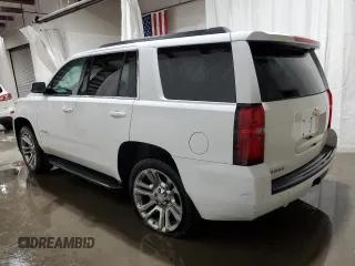 2019 Chevrolet Tahoe LS z VIN 1GNSKAKC7KR279792, wystawiony jako Copart lot #59736665 z przebiegiem 103 984 mil mil oraz Szkoda całkowita • Salvage title. Historia ofert i sprzedaży dostępna na DreamBid. Obrazek 2.