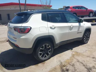 2019 Jeep Compass Trailhawk with VIN 3C4NJDDB4KT780239, listed as a IAAI auction lot 42095643 with 68,995 mi miles and . Bid and sale history available at DreamBid. Image 4.