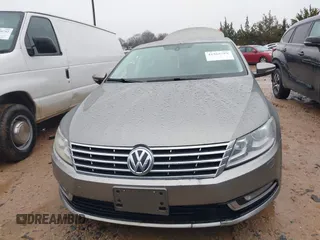2013 Volkswagen CC Sport with VIN WVWBP7AN1DE520434, listed as a IAAI auction lot 41565789 with 273,503 mi miles. Bid and sale history available at carsss.com. Image 12.