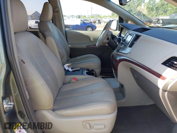 2014 Toyota Sienna XLE with VIN 5TDYK3DC6ES414892, listed as a IAAI auction lot 42545666 with 135,805 mi miles and . Bid and sale history available at DreamBid. Image 5.