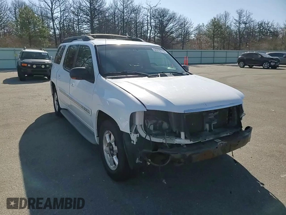 2003 GMC Envoy SLT z VIN 1GKET16S736179347, wystawiony jako Copart lot #52370775 z przebiegiem 230 623 mil mil oraz Szkoda całkowita • Salvage title. Historia ofert i sprzedaży dostępna na DreamBid. Obrazek 11.