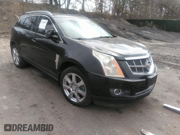 2012 Cadillac SRX Performance Collection z VIN 3GYFNBE39CS641892, wystawiony jako IAAI lot #41395695 z przebiegiem 95 303 mil mil oraz . Historia ofert i sprzedaży dostępna na DreamBid. Obrazek 2.
