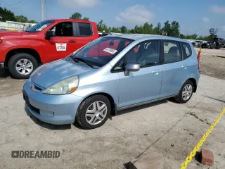 2007 Honda Fit with VIN JHMGD38427S053646, listed as a Copart auction lot 64139055 with 89,422 mi miles and Clean title. Bid and sale history available at DreamBid. Image 1.