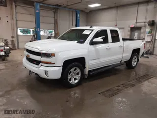 2018 Chevrolet Silverado 1500 LT with VIN 1GCVKREC6JZ239038, listed as a IAAI auction lot 41391604 with 134,129 mi miles. Bid and sale history available at carsss.com. Image 2.