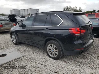 2015 BMW X5 sDrive35i with VIN 5UXKR2C57F0H37742, listed as a Copart auction lot 47573415 with 142,259 mi miles and Clean Title. Bid and sale history available at carsss.com. Image 2.