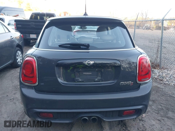 2016 MINI Cooper Hardtop 4 Door S with VIN WMWXU3C56G2B63682, listed as a IAAI auction lot 41244676 with 110,902 mi miles. Bid and sale history available at carsss.com. Image 17.