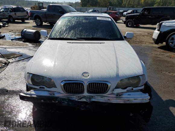2003 BMW 3 Series 330Ci with VIN WBABN53433PH03075, listed as a Copart auction lot 77252924 with 191,265 mi miles and Salvage title. Bid and sale history available at DreamBid. Image 5.