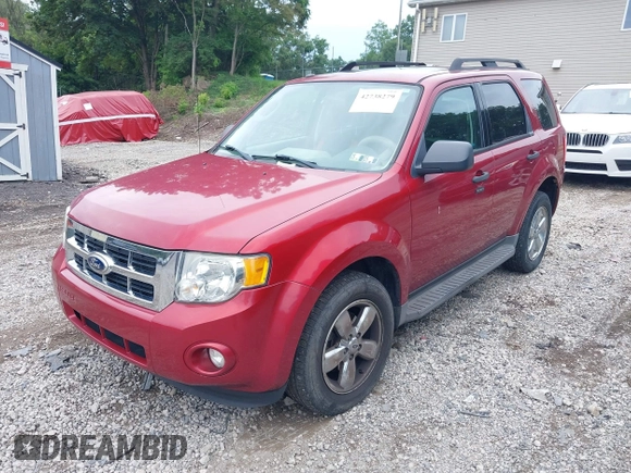 2012 Ford Escape XLT with VIN 1FMCU0D75CKC78759, listed as a IAAI auction lot 42738279 with 119,559 mi miles and . Bid and sale history available at DreamBid. Image 2.