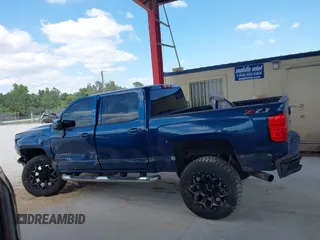 2018 Chevrolet Silverado 1500 LT with VIN 3GCUKREC0JG366590, listed as a IAAI auction lot 42045634 with 92,989 mi miles. Bid and sale history available at carsss.com. Image 14.