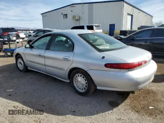 1996 Mercury Sable LS z VIN 1MELM53S7TA600376, wystawiony jako Copart lot #45529455 z przebiegiem 184 855 mil mil oraz Szkody całkowita. Historia ofert i sprzedaży dostępna na DreamBid. Obrazek 2.