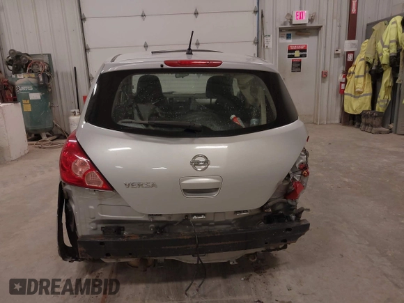 2010 Nissan Versa S z VIN 3N1BC1CP9AL363631, wystawiony jako IAAI lot #41987554 z przebiegiem 133 921 mil mil oraz . Historia ofert i sprzedaży dostępna na DreamBid. Obrazek 16.