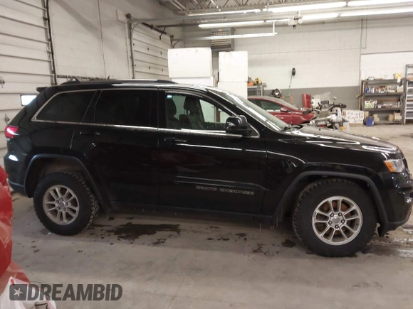 2018 Jeep Grand Cherokee Laredo E with VIN 1C4RJFAG0JC154937, listed as a IAAI auction lot 41966764 with 85,415 mi miles and . Bid and sale history available at DreamBid. Image 14.