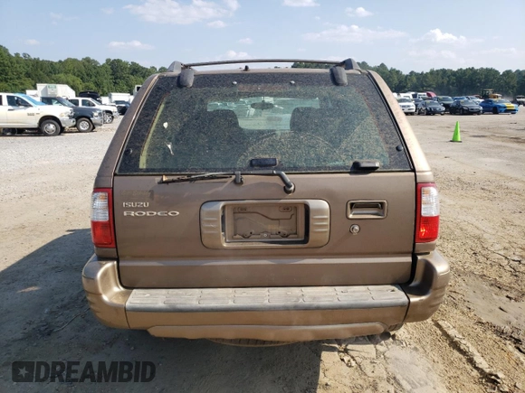 2002 Isuzu Rodeo S with VIN 4S2CK58W924327316, listed as a Copart auction lot 68512854 with 110,826 mi miles and Salvage Title. Bid and sale history available at DreamBid. Image 6.