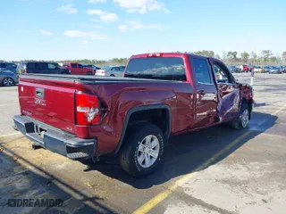 2014 GMC Sierra 1500 SLE with VIN 1GTV2UEH3EZ295586, listed as a IAAI auction lot 41399287 with 124,973 mi miles. Bid and sale history available at carsss.com. Image 4.