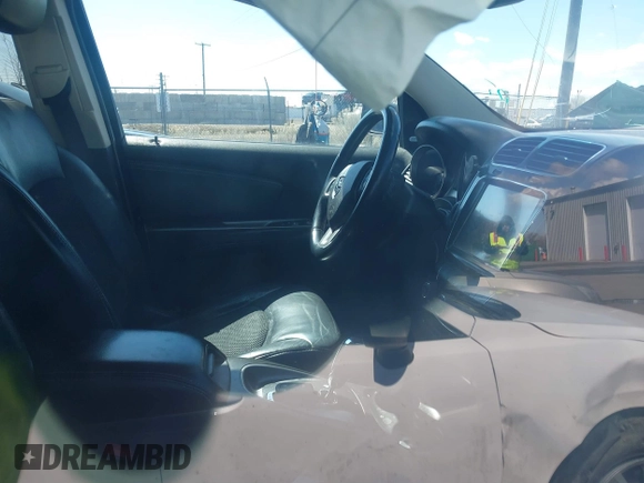 2014 Dodge Journey Crossroad with VIN 3C4PDDGGXET263930, listed as a IAAI auction lot 41826889 with 201,431 mi miles and . Bid and sale history available at DreamBid. Image 5.
