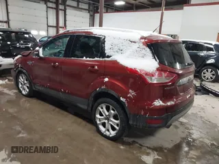 2016 Ford Escape Titanium with VIN 1FMCU9JX6GUB57497, listed as a IAAI auction lot 41375019 with 1 mi miles. Bid and sale history available at carsss.com. Image 3.