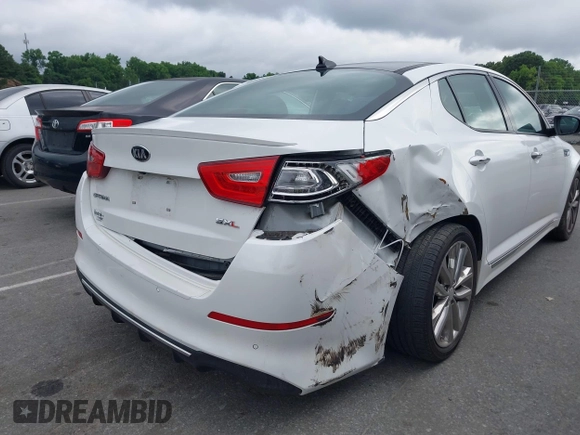 2015 Kia Optima SX Turbo with VIN 5XXGR4A69FG443396, listed as a IAAI auction lot 42464162 with 118,094 mi miles and . Bid and sale history available at DreamBid. Image 6.