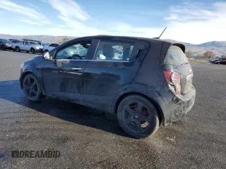 2012 Chevrolet Sonic LTZ z VIN 1G1JE6SH2C4126197, wystawiony jako Copart lot #85541214 z przebiegiem Nie podano mil oraz Szkoda całkowita • Salvage title. Historia ofert i sprzedaży dostępna na DreamBid. Obrazek 2.