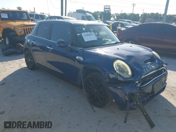 2016 MINI Cooper Hardtop 4 Door S with VIN WMWXU3C54G2D30766, listed as a IAAI auction lot 42008026 with 101,898 mi miles. Bid and sale history available at carsss.com. Image 1.