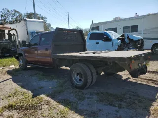 2003 Chevrolet Silverado 3500 LT with VIN 1GCJK33123F252080, listed as a Copart auction lot 77593284 with 195,009 mi miles and Salvage Title. Bid and sale history available at carsss.com. Image 2.