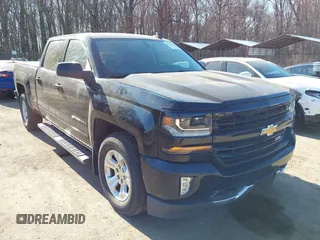 2018 Chevrolet Silverado 1500 LT with VIN 1GCUKREC3JF119906, listed as a IAAI auction lot 41765398 with 122,472 mi miles and . Bid and sale history available at DreamBid. Image 6.