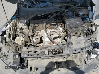 2022 Honda Civic Sport z VIN 2HGFE2F54NH515517, wystawiony jako Copart lot #54695585 z przebiegiem Nie podano mil oraz Szkoda całkowita • Salvage title. Historia ofert i sprzedaży dostępna na DreamBid. Obrazek 11.