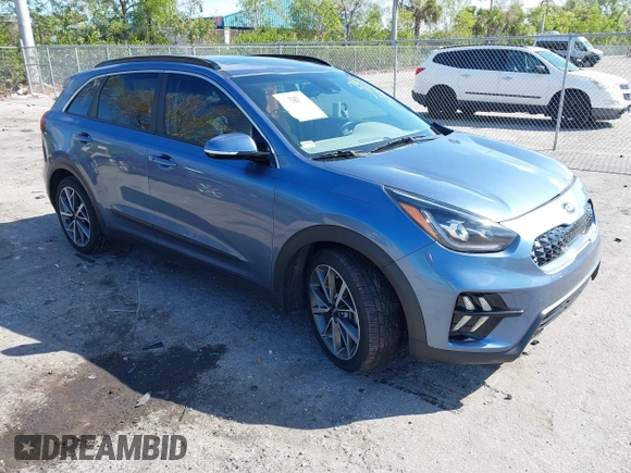 2021 Kia Niro Touring with VIN KNDCC3LC3M5483455, listed as a IAAI auction lot 41678795 with 132,216 mi miles. Bid and sale history available at carsss.com. Image 1.