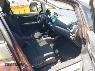 2015 Honda Fit EX-L with VIN 3HGGK5H88FM729435, listed as a IAAI auction lot 41998376 with 130,723 mi miles. Bid and sale history available at carsss.com. Image 5.