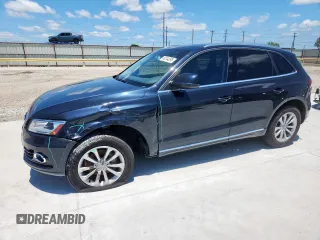 2014 Audi Q5 Premium Plus with VIN WA1LFAFPXEA115657, listed as a Copart auction lot 60244395 with 128,313 mi miles and Salvage title. Bid and sale history available at DreamBid. Image 1.