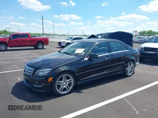 2011 Mercedes-Benz C C 300 Sport with VIN WDDGF5EBXBA520097, listed as a IAAI auction lot 42099592 with 115,849 mi miles. Bid and sale history available at carsss.com. Image 2.