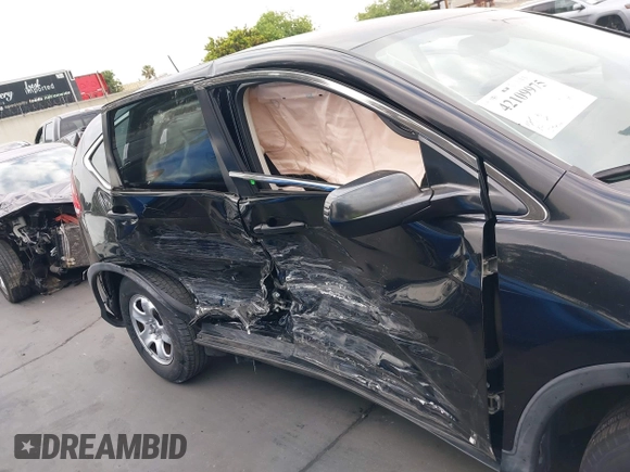 2014 Honda CR-V LX with VIN 2HKRM3H30EH551163, listed as a IAAI auction lot 42109975 with 57,712 mi miles. Bid and sale history available at carsss.com. Image 18.