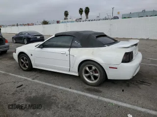 2004 Ford Mustang Deluxe z VIN 1FAFP44454F123067, wystawiony jako Copart lot #86784474 z przebiegiem 161 541 mil mil oraz Szkoda całkowita • Salvage title. Historia ofert i sprzedaży dostępna na DreamBid. Obrazek 2.