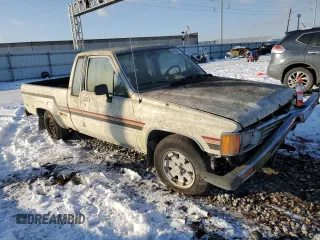 1984 Toyota Pickup z VIN JT4RN56S0E0003177, wystawiony jako Copart lot #48304385 z przebiegiem 117 297 mil mil oraz Szkoda całkowita • Salvage title. Historia ofert i sprzedaży dostępna na DreamBid. Obrazek 4.