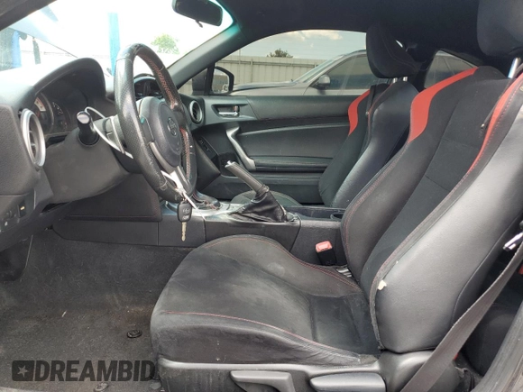 2015 Scion FR-S z VIN JF1ZNAA12F8707784, wystawiony jako Copart lot #56248735 z przebiegiem 119 679 mil mil oraz Szkoda całkowita • Salvage title. Historia ofert i sprzedaży dostępna na DreamBid. Obrazek 7.