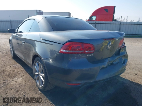 2015 Volkswagen Eos Komfort with VIN WVWBW8AH7FV004228, listed as a IAAI auction lot 41659825 with 71,468 mi miles and . Bid and sale history available at DreamBid. Image 3.
