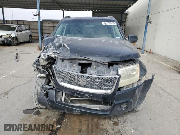2009 Suzuki Grand Vitara with VIN JS3TE044094100649, listed as a Copart auction lot 52033855 with 137,460 mi miles and Salvage title. Bid and sale history available at DreamBid. Image 5.
