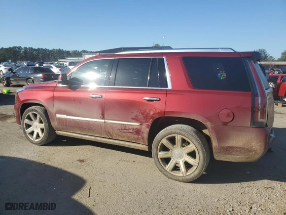 2020 Cadillac Escalade Premium Luxury with VIN 1GYS4CKJ7LR102961, listed as a Copart auction lot 48673875 with 142,808 mi miles and Salvage Title. Bid and sale history available at carsss.com. Image 2.