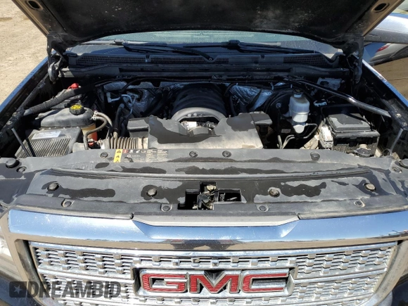 2017 GMC Sierra 1500 Denali z VIN 3GTU2PEJ7HG133884, wystawiony jako Copart lot #58940485 z przebiegiem 241 697 mil mil oraz Czysty tytuł • Clean title. Historia ofert i sprzedaży dostępna na DreamBid. Obrazek 11.