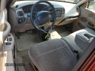 1998 Ford F-150 with VIN 1FTZX18W8WNB76999, listed as a Copart auction lot 59845595 with 135,063 mi miles and Salvage title. Bid and sale history available at DreamBid. Image 8.