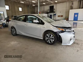 2017 Toyota Prius Plus with VIN JTDKARFP3H3060878, listed as a Copart auction lot 64452005 with 94,367 mi miles and Salvage title. Bid and sale history available at DreamBid. Image 4.