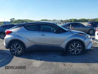 2019 Toyota C-HR XLE with VIN NMTKHMBX4KR082574, listed as a IAAI auction lot 41694921 with 61,777 mi miles and . Bid and sale history available at DreamBid. Image 13.