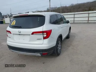 2022 Honda Pilot EX-L с VIN 5FNYF6H56NB098884, выставлен на аукционе IAAI как лот 41924421 с пробегом 68 868 миль миль и . История ставок и продаж доступна на DreamBid. Изображение 4.