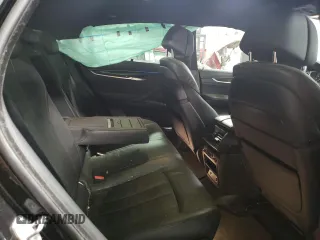 2015 BMW X6 xDrive35i with VIN 5UXKU2C50F0F94986, listed as a Copart auction lot 76998613 with 165,678 mi miles. Bid and sale history available at carsss.com. Image 10.