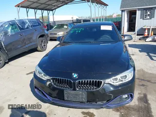 2016 BMW 4 Series 428i xDrive with VIN WBA4C9C53GG135945, listed as a IAAI auction lot 41964691 with 93,273 mi miles and . Bid and sale history available at carsss.com. Image 12.