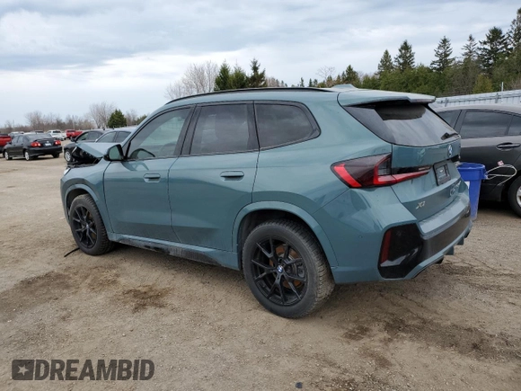 2023 BMW X1 xDrive28i with VIN WBX73EF02P5W11223, listed as a Copart auction lot 49205155 with 17,083 mi miles and Salvage Title. Bid and sale history available at DreamBid. Image 2.