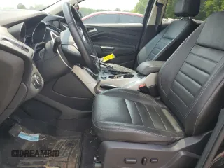 2013 Ford Escape SEL z VIN 1FMCU9H94DUD47723, wystawiony jako Copart lot #59765595 z przebiegiem 129 551 mil mil oraz Szkoda całkowita • Salvage title. Historia ofert i sprzedaży dostępna na DreamBid. Obrazek 7.