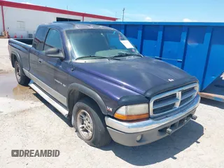 1999 Dodge Dakota SLT with VIN 1B7GL22X0XS301104, listed as a IAAI auction lot 42556302 with 194,752 mi miles and . Bid and sale history available at DreamBid. Image 1.
